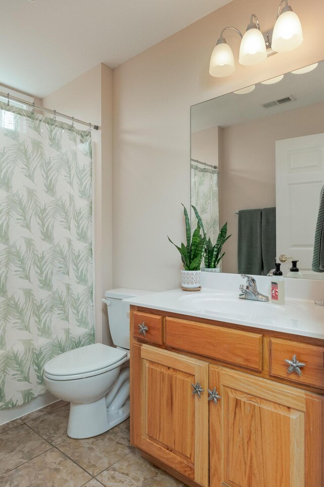 750 Windrush Loop, Chattanooga, TN 37421 - bathroom featuring vanity and tile patterned floors