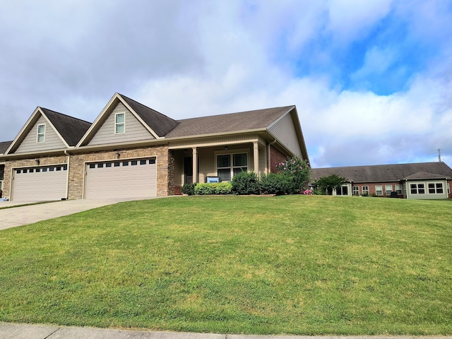 179 Trade Wind Dr, Fort Oglethorpe, GA 30742 - view of front of property featuring a front yard, driveway, an attached garage, and brick siding
