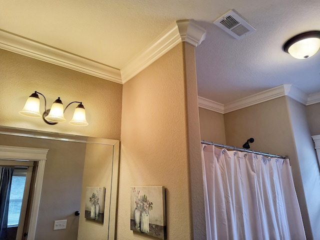 179 Trade Wind Dr, Fort Oglethorpe, GA 30742 - bathroom view of a textured wall, ornamental molding, a textured ceiling, and curtained shower