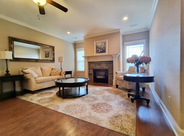 179 Trade Wind Dr, Fort Oglethorpe, GA 30742 - living area with wood finished floors, a stone fireplace, a ceiling fan, crown molding, and recessed lighting