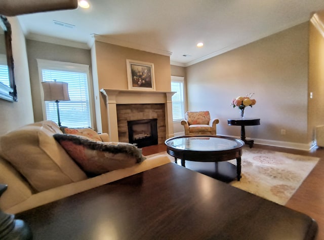 179 Trade Wind Dr, Fort Oglethorpe, GA 30742 - living room featuring crown molding, a fireplace, wood finished floors, and recessed lighting