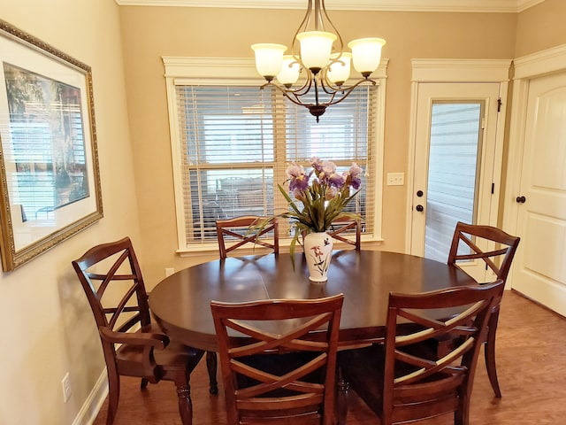 179 Trade Wind Dr, Fort Oglethorpe, GA 30742 - dining area with a chandelier and crown molding
