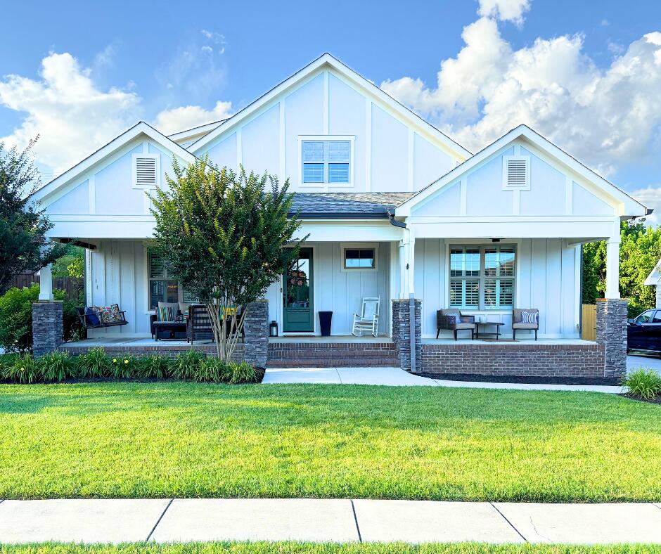 3528 Morning Dew Cv, Apison, TN 37302 - craftsman-style home with a porch, a front lawn, outdoor lounge area, and board and batten siding