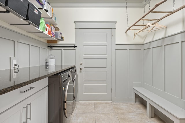 3528 Morning Dew Cv, Apison, TN 37302 - laundry room featuring a decorative wall, separate washer and dryer, light tile patterned floors, crown molding, and a wainscoted wall