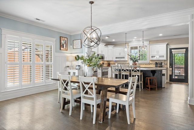 3528 Morning Dew Cv, Apison, TN 37302 - dining area featuring crown molding, a chandelier, dark wood-type flooring, wainscoting, and recessed lighting