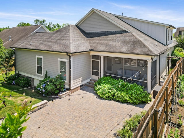 3528 Morning Dew Cv, Apison, TN 37302 - back of property featuring a sunroom and a shingled roof