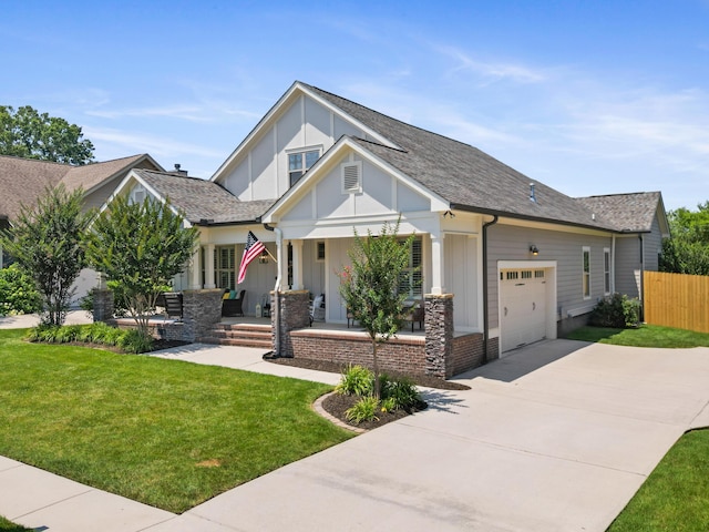 3528 Morning Dew Cv, Apison, TN 37302 - view of front facade featuring covered porch, driveway, a garage, board and batten siding, and a shingled roof