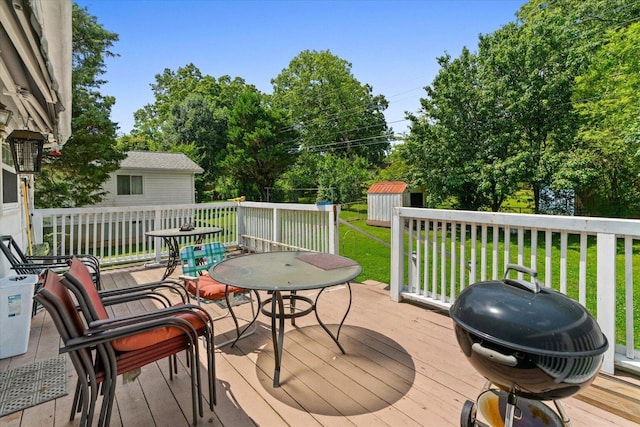 1339 Cloverdale Cir, Hixson, TN 37343 - wooden terrace with a storage shed, a yard, and grilling area