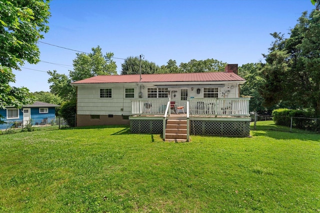 1339 Cloverdale Cir, Hixson, TN 37343 - back of property featuring a chimney, a deck, a metal roof, and crawl space