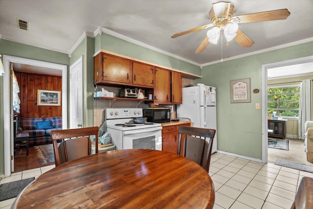 1339 Cloverdale Cir, Hixson, TN 37343 - kitchen with white appliances, light tile patterned floors, ceiling fan, brown cabinets, and open shelves