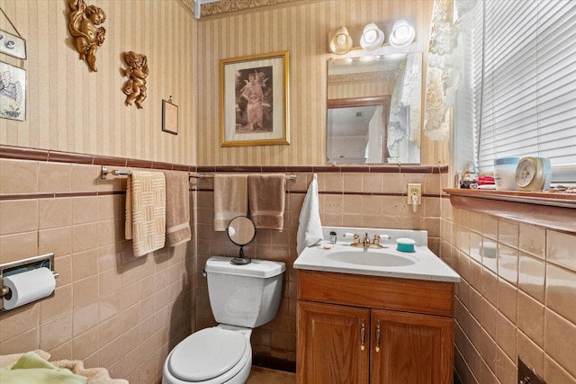1339 Cloverdale Cir, Hixson, TN 37343 - half bathroom featuring wallpapered walls, vanity, wainscoting, and tile walls
