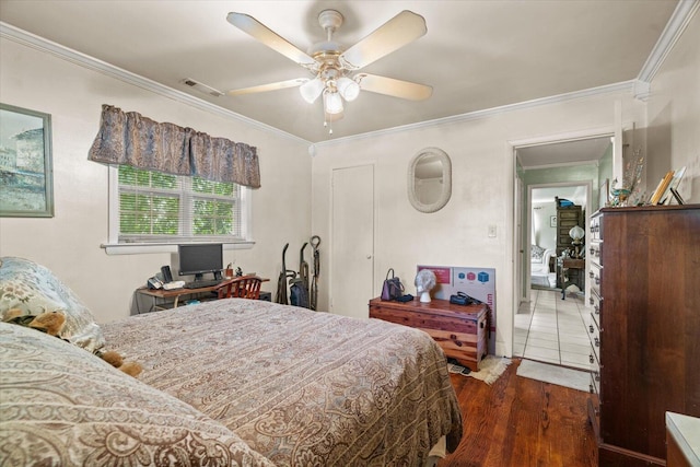 1339 Cloverdale Cir, Hixson, TN 37343 - bedroom featuring wood finished floors, ornamental molding, and a ceiling fan