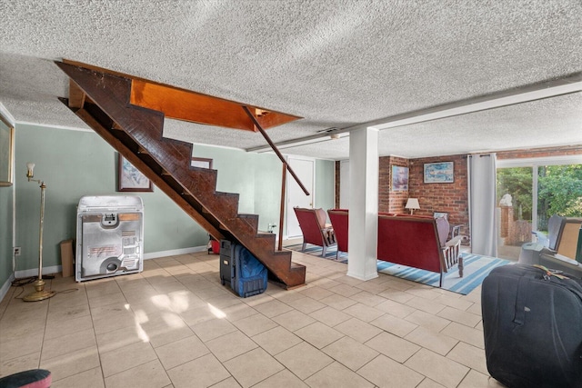 1339 Cloverdale Cir, Hixson, TN 37343 - below grade area featuring stairs, a textured ceiling, and tile patterned floors