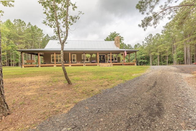 508 Chattanooga Rd, Cohutta, GA 30710 - farmhouse featuring covered porch, a chimney, a metal roof, and a front lawn