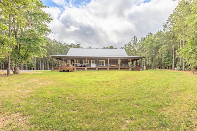508 Chattanooga Rd, Cohutta, GA 30710 - back of property with a porch, a lawn, and a metal roof