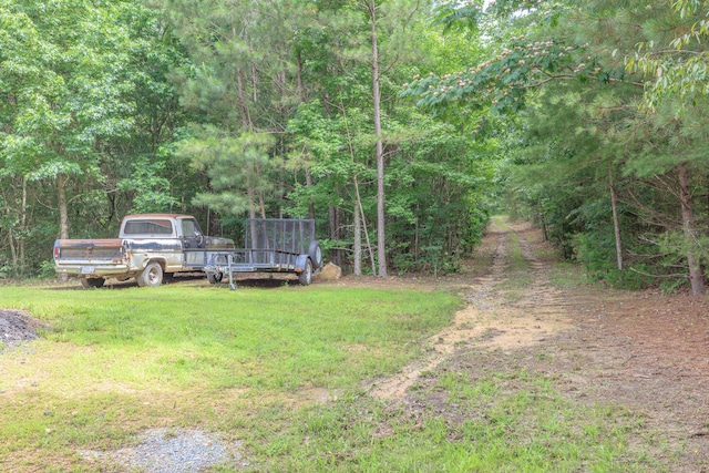 508 Chattanooga Rd, Cohutta, GA 30710 - view of green lawn featuring a forest view
