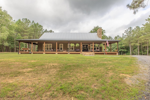 508 Chattanooga Rd, Cohutta, GA 30710 - view of front of home with covered porch, a front lawn, a chimney, and a metal roof