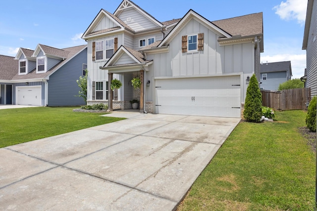 8517 Kensley Ln, Hixson, TN 37343 - view of front of property featuring board and batten siding, driveway, a garage, and roof with shingles