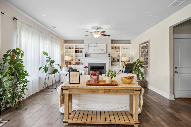 8517 Kensley Ln, Hixson, TN 37343 - living room featuring a ceiling fan, dark wood-style flooring, and a fireplace