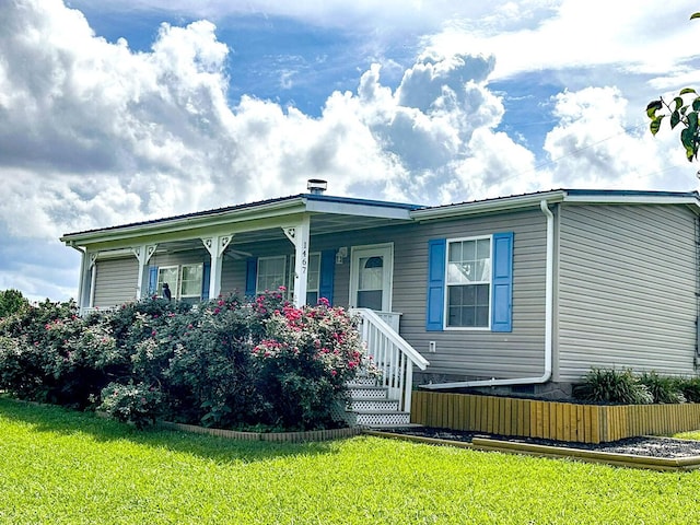 1467 Squire Fox Rd, Dandridge, TN 37725 - view of front facade featuring covered porch and a front yard