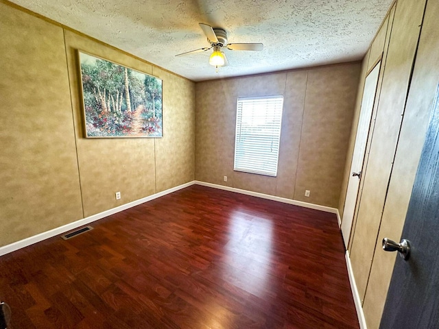 1467 Squire Fox Rd, Dandridge, TN 37725 - unfurnished room featuring wood finished floors, a ceiling fan, and a textured ceiling