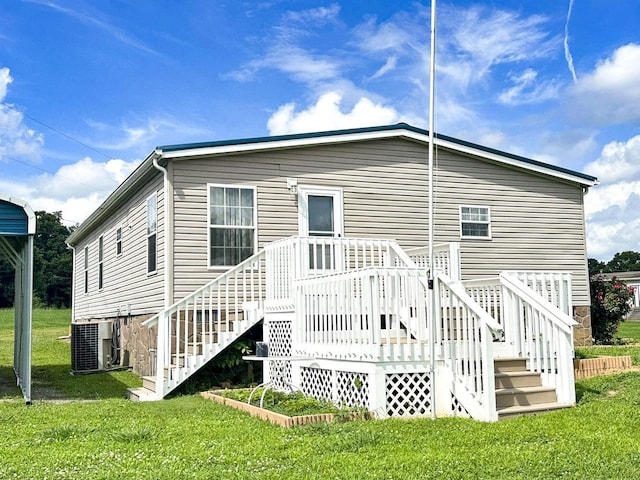 1467 Squire Fox Rd, Dandridge, TN 37725 - rear view of house with stairway, a yard, and a deck