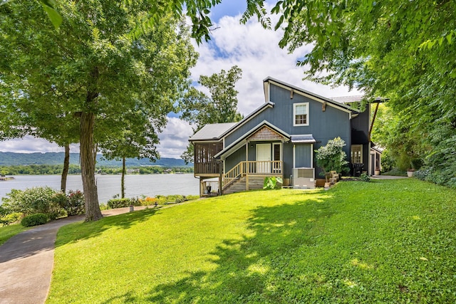 8223 Snow Hill Rd, Ooltewah, TN 37363 - view of front of property featuring a front yard and a water view