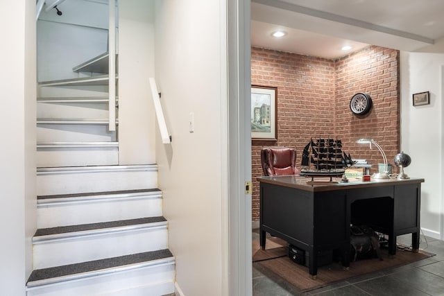 8223 Snow Hill Rd, Ooltewah, TN 37363 - stairs featuring brick wall, tile patterned flooring, and recessed lighting