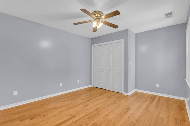 7414 Hamilton Run Dr, Chattanooga, TN 37421 - unfurnished bedroom featuring light wood finished floors, a closet, and a ceiling fan