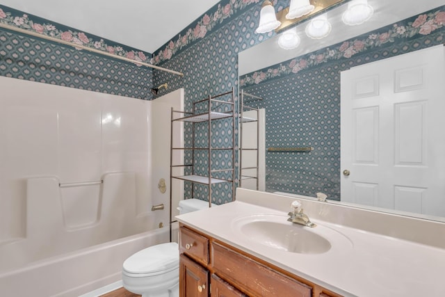 7414 Hamilton Run Dr, Chattanooga, TN 37421 - bathroom featuring wallpapered walls, vanity, and shower / bathtub combination