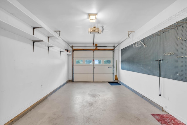 7414 Hamilton Run Dr, Chattanooga, TN 37421 - garage with a garage door opener and baseboards