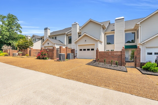 7414 Hamilton Run Dr, Chattanooga, TN 37421 - multi unit property featuring concrete driveway, a gate, and a residential view