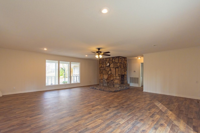 136 Cochran Dr NE, Dalton, GA 30721 - unfurnished living room featuring dark wood-style flooring, a ceiling fan, recessed lighting, and a stone fireplace