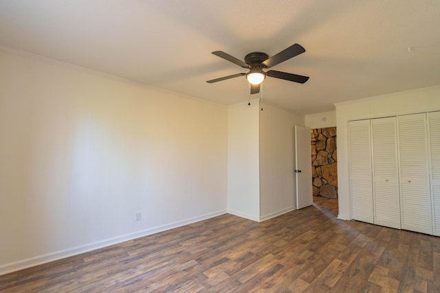 136 Cochran Dr NE, Dalton, GA 30721 - unfurnished bedroom featuring crown molding, wood finished floors, a closet, and ceiling fan