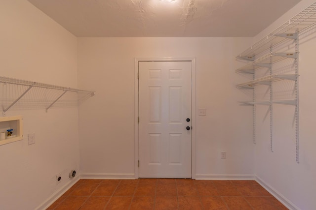 136 Cochran Dr NE, Dalton, GA 30721 - laundry area with hookup for a washing machine and tile patterned floors