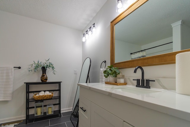 136 Cochran Dr NE, Dalton, GA 30721 - bathroom featuring vanity, tile patterned floors, and a textured ceiling