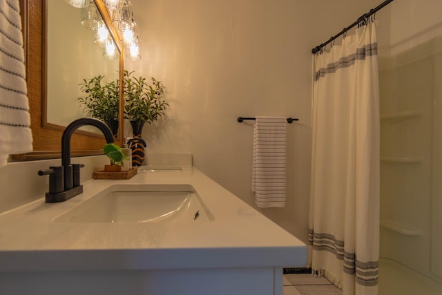 136 Cochran Dr NE, Dalton, GA 30721 - bathroom featuring double vanity and a shower with curtain