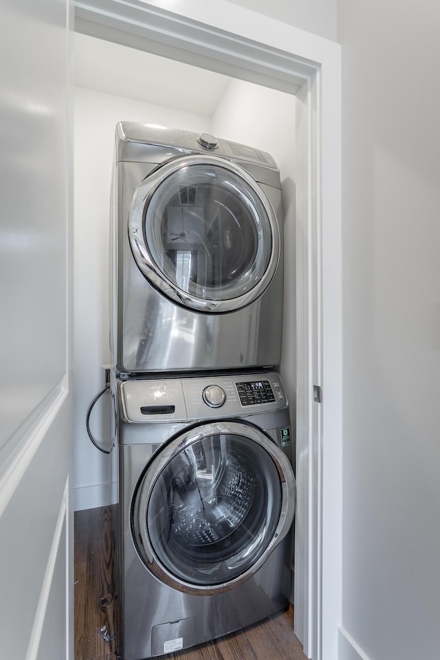 1621 Fagan St Unit 109, Chattanooga, TN 37408 - laundry area with stacked washer / dryer and wood finished floors