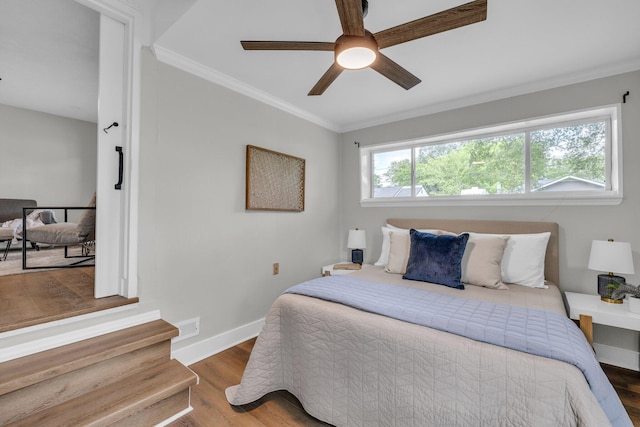 1610 Truman Ave, Chattanooga, TN 37412 - bedroom featuring wood finished floors, crown molding, and ceiling fan