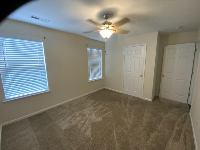 904 Cedar Creek Dr, Rossville, GA 30741 - unfurnished bedroom featuring carpet floors and a ceiling fan