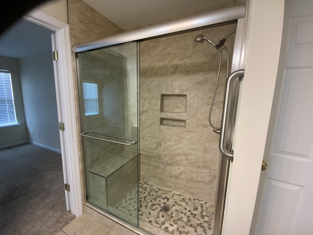 904 Cedar Creek Dr, Rossville, GA 30741 - full bath with a stall shower and tile patterned flooring