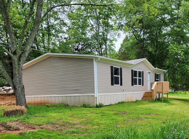 1918 Spradling Rd, Soddy Daisy, TN 37379 - view of side of property featuring a yard and a deck
