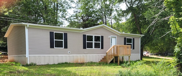 1918 Spradling Rd, Soddy Daisy, TN 37379 - manufactured / mobile home with a front yard and view of scattered trees