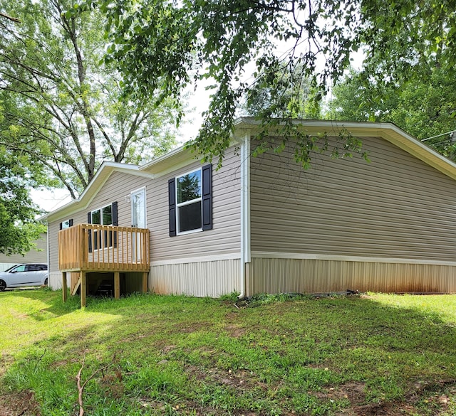 1918 Spradling Rd, Soddy Daisy, TN 37379 - view of home's exterior with a deck and a lawn