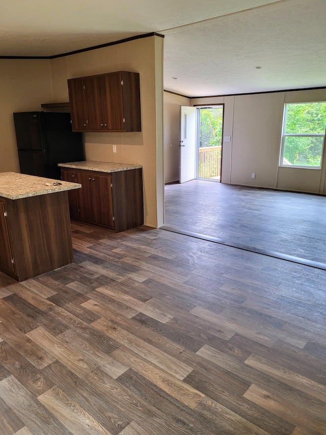 1918 Spradling Rd, Soddy Daisy, TN 37379 - kitchen with freestanding refrigerator, healthy amount of natural light, dark wood-type flooring, and open floor plan