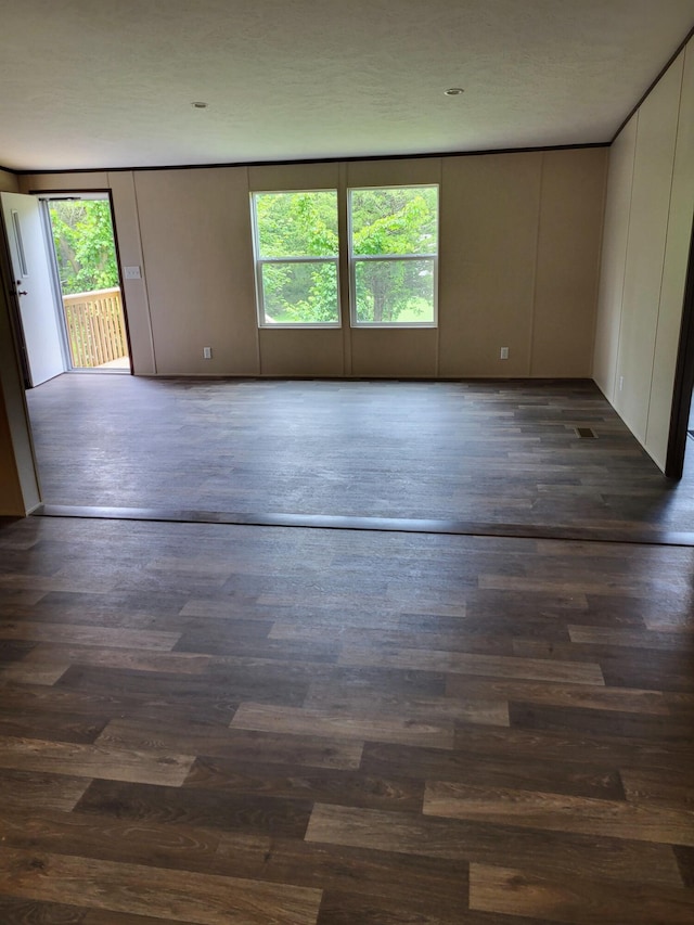 1918 Spradling Rd, Soddy Daisy, TN 37379 - unfurnished room with healthy amount of natural light and dark wood-style floors