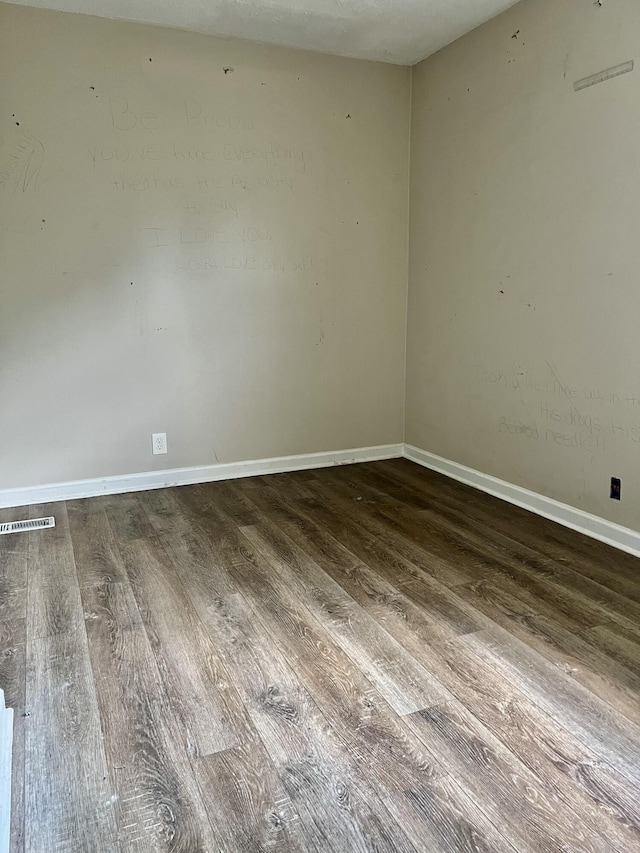 43 Fir St, Chickamauga, GA 30707 - spare room featuring wood finished floors and baseboards