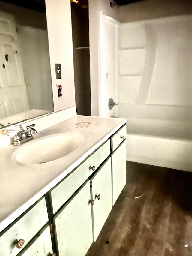 43 Fir St, Chickamauga, GA 30707 - full bath with vanity, bathtub / shower combination, and wood finished floors