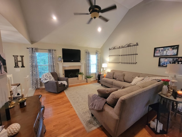 458 Fieldstone Dr, Ringgold, GA 30736 - living room with ceiling fan, light wood finished floors, a fireplace, high vaulted ceiling, and recessed lighting