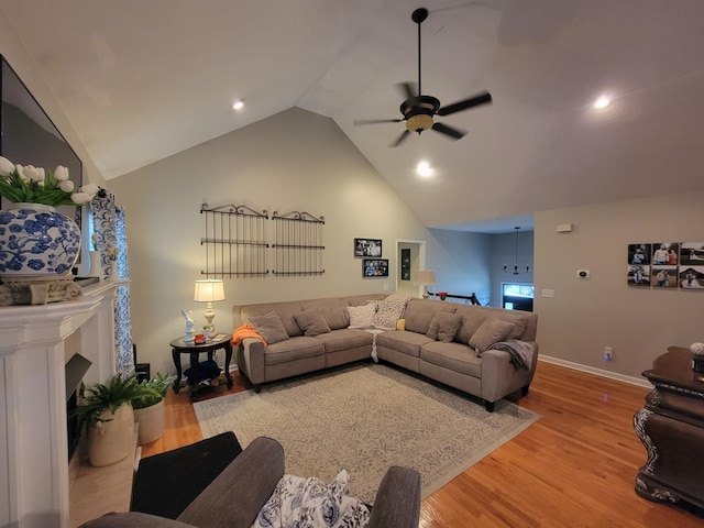 458 Fieldstone Dr, Ringgold, GA 30736 - living room with a ceiling fan, lofted ceiling, light wood-type flooring, a fireplace, and recessed lighting